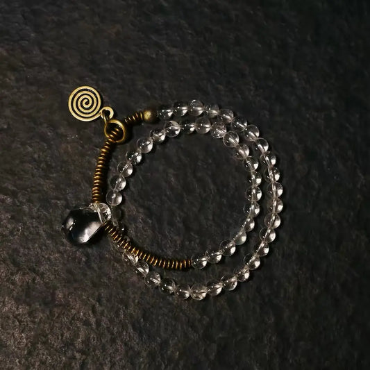 Handcrafted clear quartz layered bracelet with copper coil and raw crystal pendant — Orienlu
