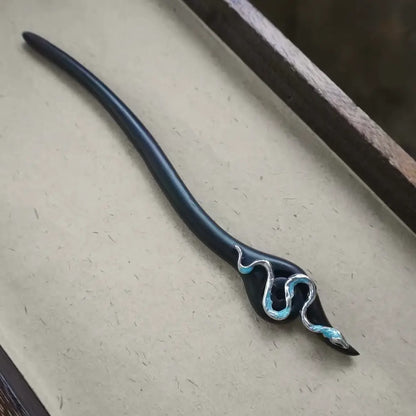 Handcrafted ebony wood hair stick with silver snake ornament trimmed in blue Orienlu
