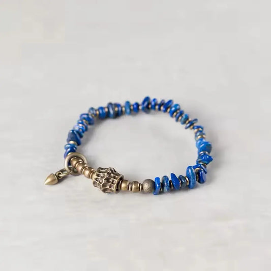 Handcrafted lapis lazuli chip bracelet with brass pendant and vintage brass spacers — Orienlu