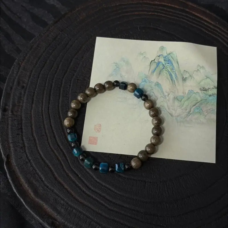 Handcrafted blue tiger eye bracelet with ancient bog wood and smoky quartz beads — Orienlu |