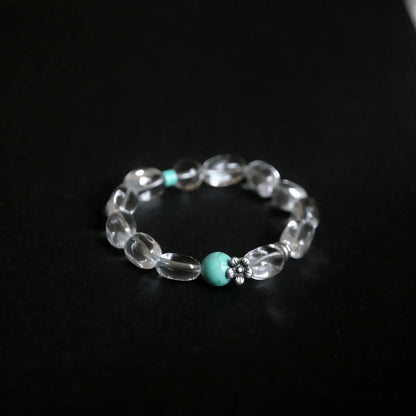 Handcrafted white quartz bracelet with clear crystal beads and turquoise magnesite accent — Orienlu