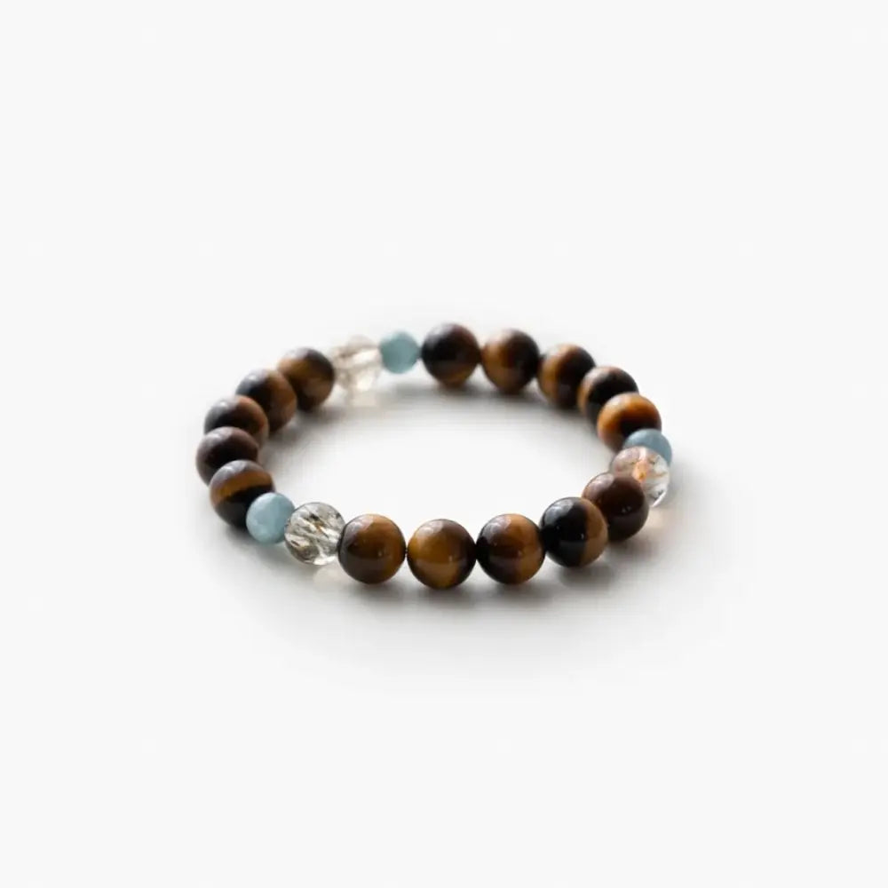 Side angle view showing texture of tiger's eye aquamarine and super seven crystal beads Orienlu